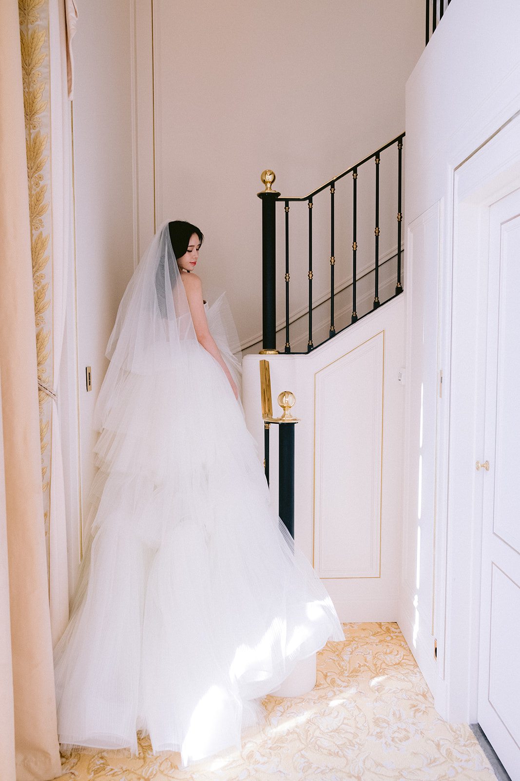 the bride dances in front of the eiffel tower